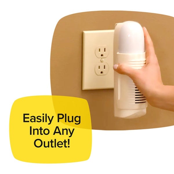 Woman's hand is holding Air Police and ready to plug it into an outlet on a tan wall. Headline says Easily Plug Into Any Outlet