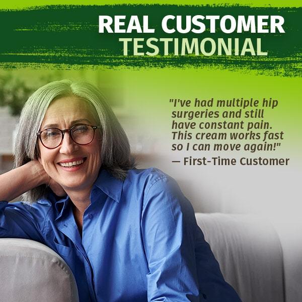 Real Customer Testimonial, woman in a blue shirt with glasses smiling.