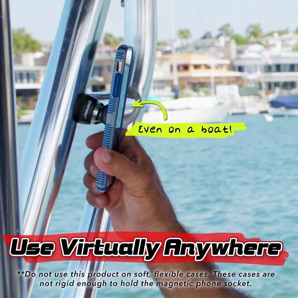 Close of up of someone mounting a phone onto a FastBall that is mounted onto a metal bar on a boat. Text says use virtually anywhere, even on a boat!