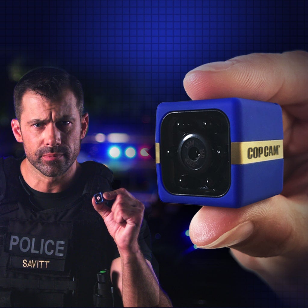 Close up of Cop Cam in someone's hand and man in police vest holding a Cop Cam