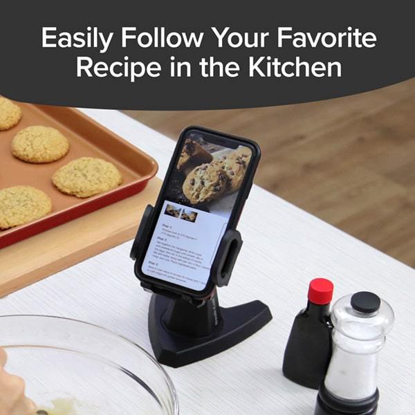 Desk Call on a kitchen counter with a smartphone in it. Headline says Easily Follow Your Favorite Recipe In the Kitchen
