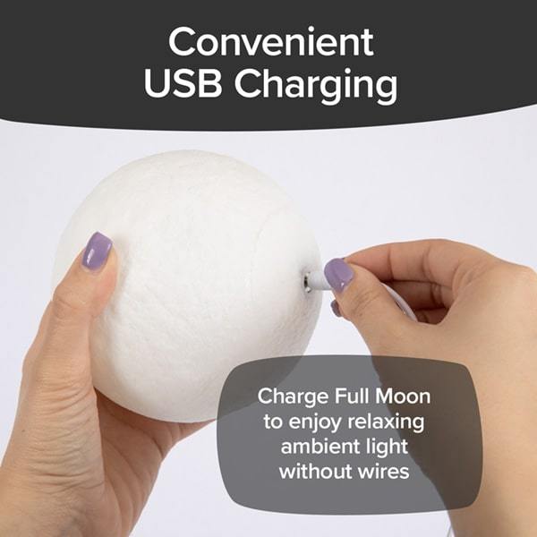 Woman plugging the charging cable into a Full Moon Lamp. Headlines say Convenient USB Charging, Charge Full Moon to enjoy relaxing ambient light without wires