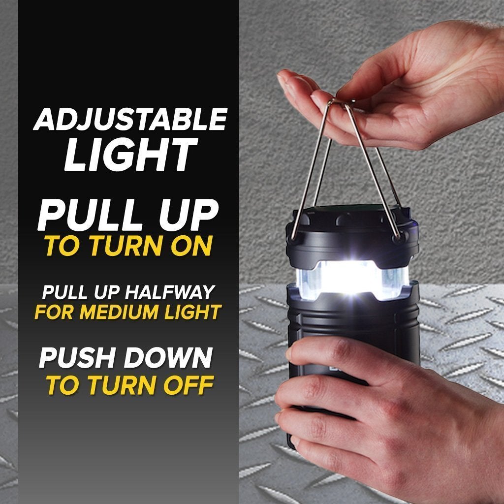 Close up of man's hands holding and Atomic Beam Lantern and pulling up on the top handle to turn it on. Text says adjustable light, pull up to turn on, pull up halfway for medium height, push down to turn off