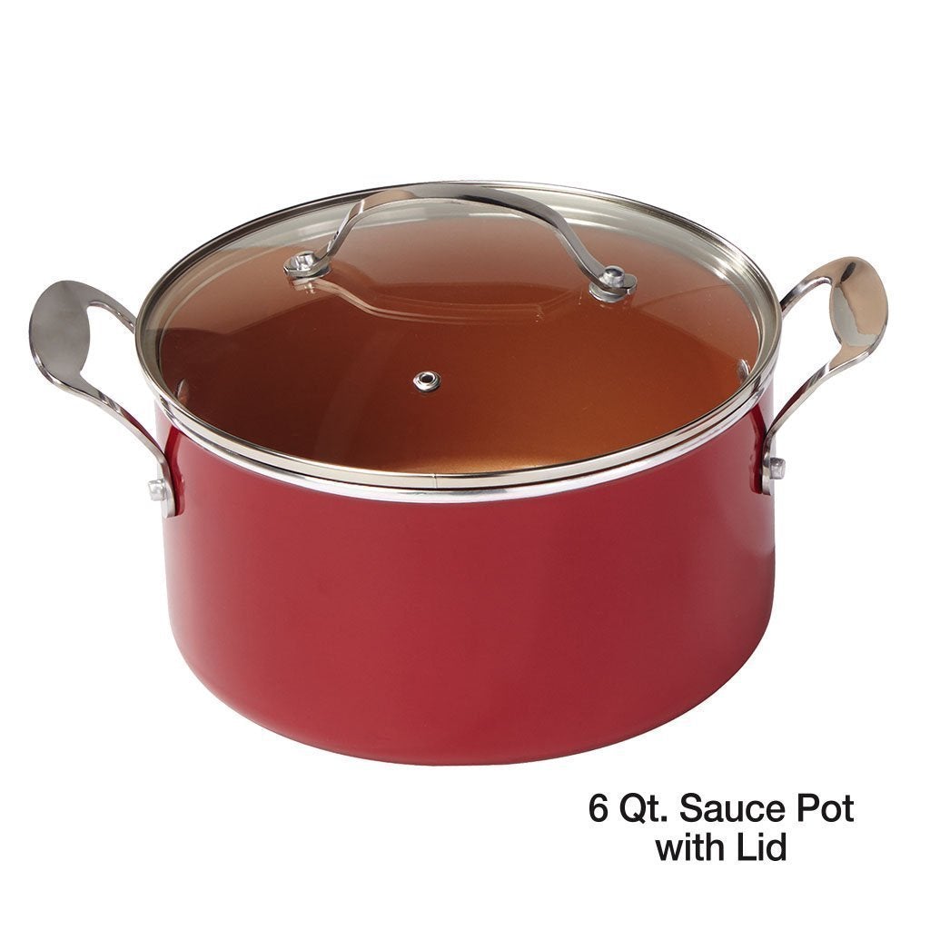 Red Copper 6 quart sauce pot with the lid on isolated on a white background
