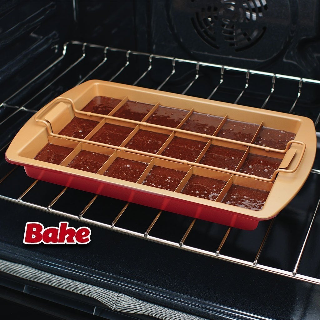 Red Copper Brownie Bonanza Pan with brownie batter in it inside of an oven